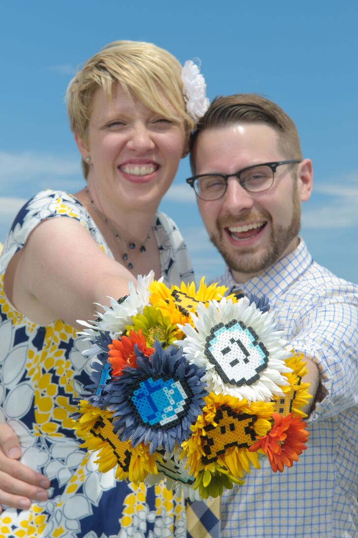 Jen designed the bouquet based on her favorite games, and used fabric flowers in lieu of fresh flowers for preservation.