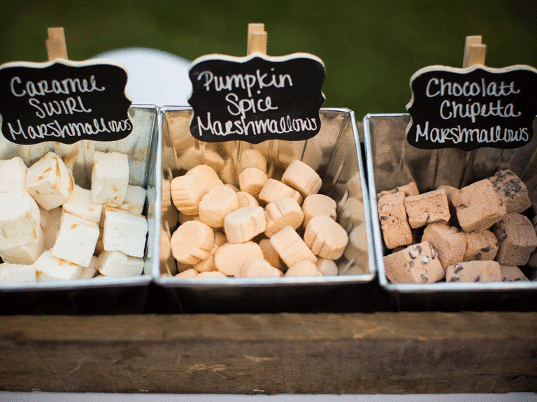 Flavored marshmallows in tin bins for s'mores.