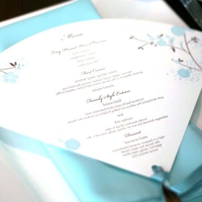 Lea created pretty, fan-shaped menu cards for the tables. Each card was created using the cherry blossom design of the day and the Tiffany blue and chocolate brown color scheme.