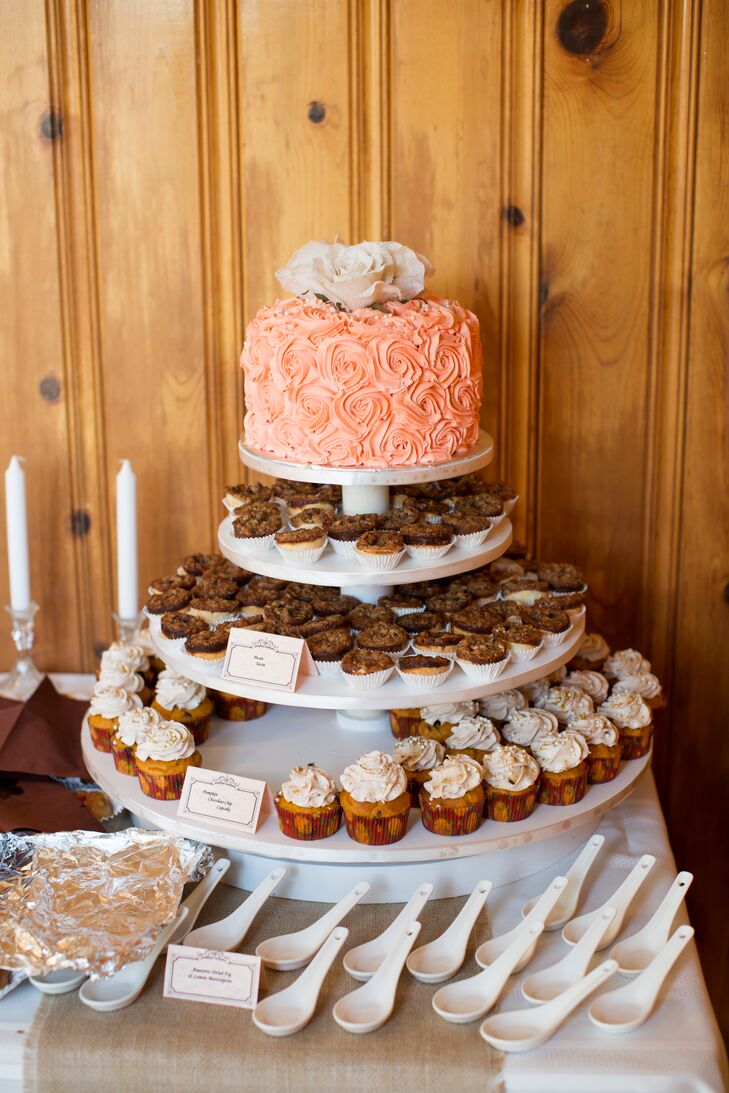 Talia and Casey's wedding cake designer created their adorable peach cake and a dessert bar that included favors from the fall season. "We had pumpkin mousse, warm figs, pecan tassies, and lots of other goodies," Talia says.