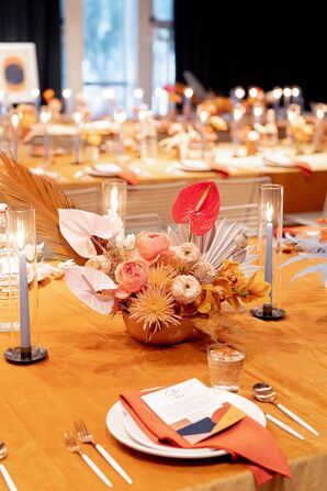 Orange Ranunculus and Anthurium Floral Centerpieces in Terra Cotta Vessels