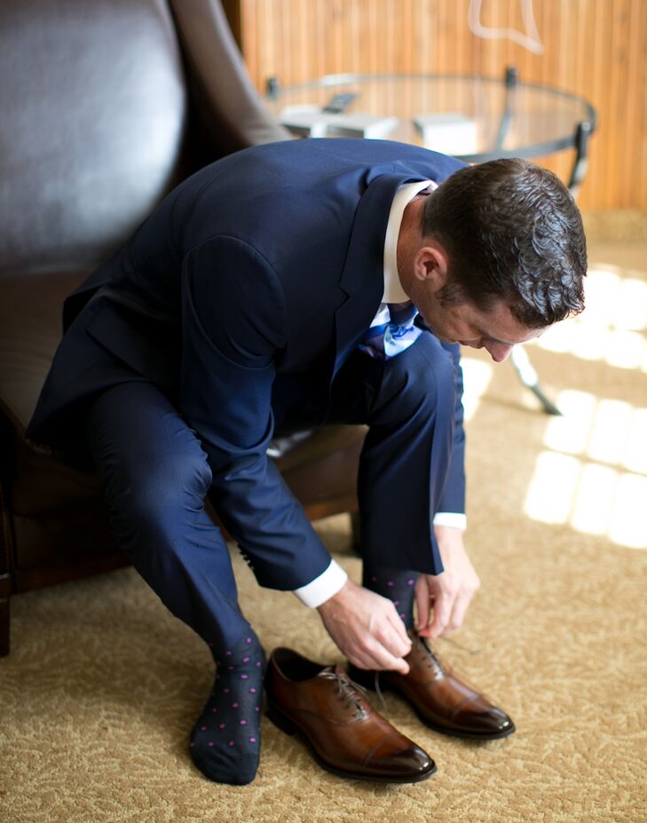 While Matt wore a Ted Baker suit and Hugo Boss bow tie, Paul wore the opposite--a navy Hugo Boss suit with a plaid blue and purple Ted Baker tie. Paul also wore brown leather shoes from To Boot New York by Adam Derric.