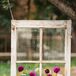 Dahlias and scabiosas in fuchsia, white and dark purple were planted in the hanging window boxes at the ceremony.