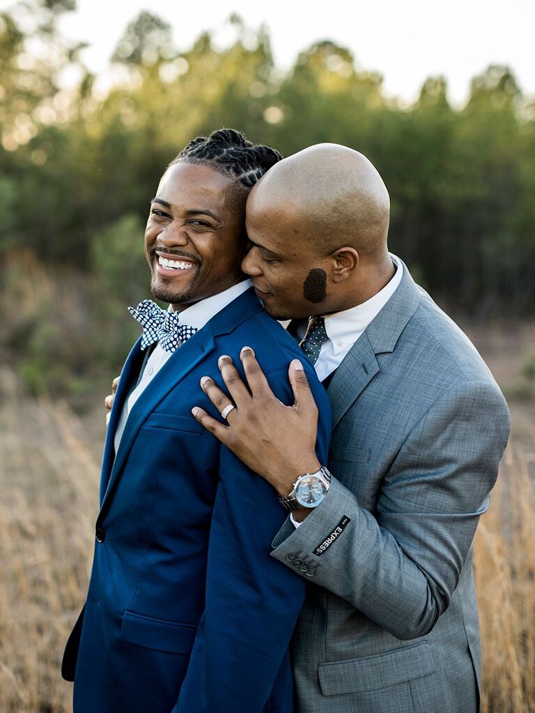 groom and groom in blue and gray suits