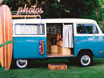 Black and white still photo of a slow motion wedding reception photo booth