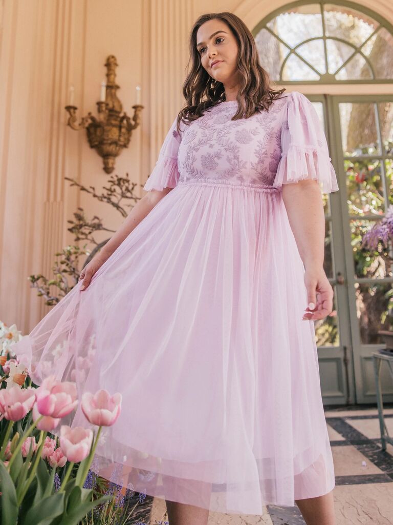 whimsical spring bridesmaid dress with floral embroidery, ruffled sleeves and tulle skirt