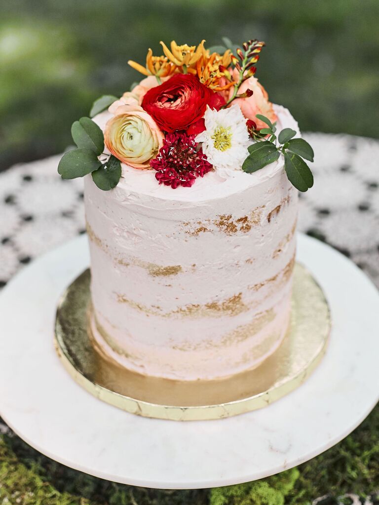 Raspberry-Filled bridal shower cake with fresh flowers
