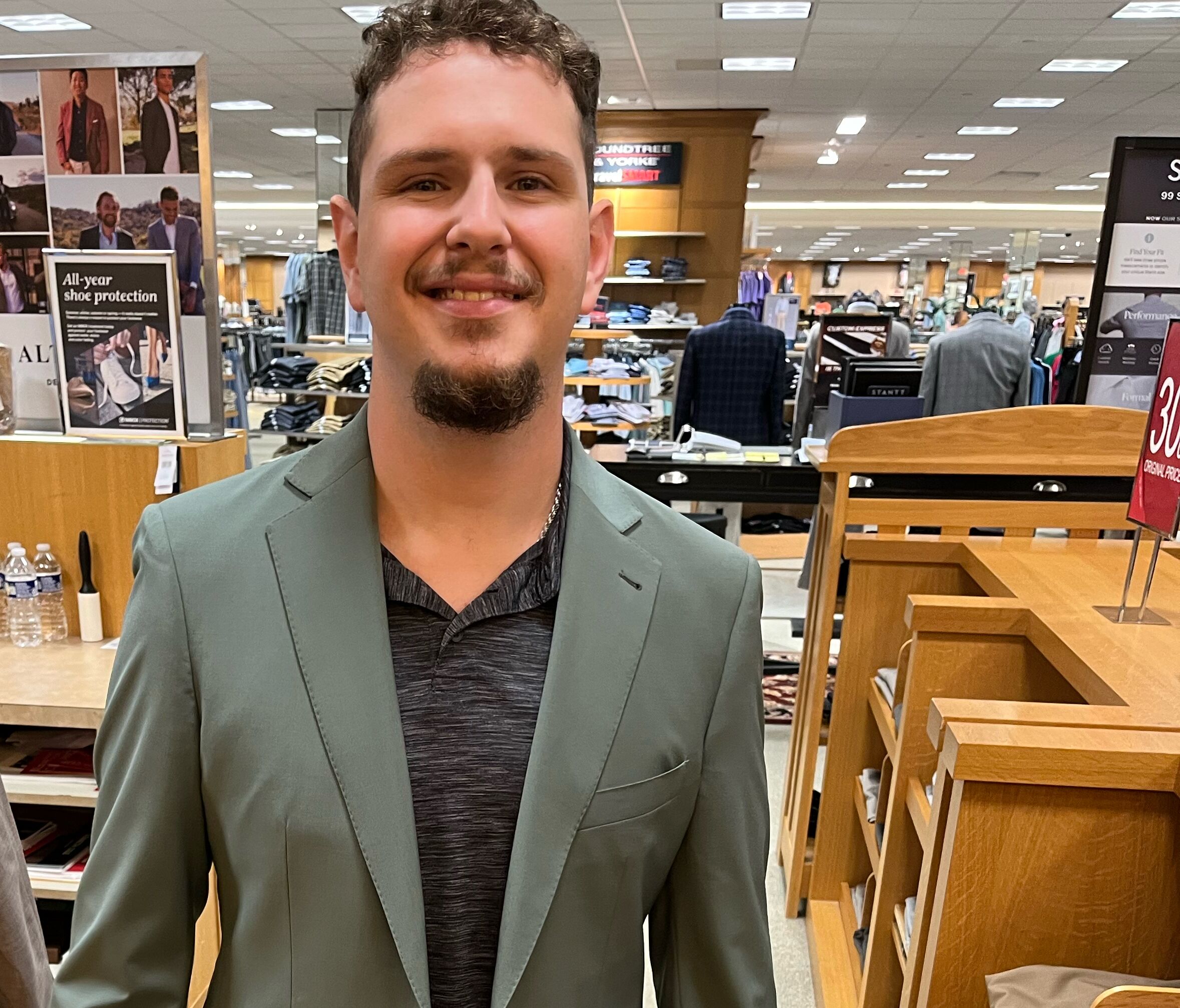 Picture of Joes first time trying on suits
