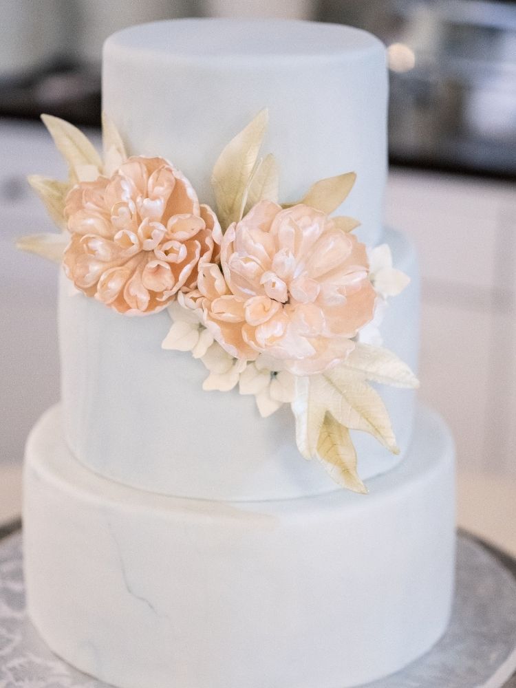 three-tier wedding cake with sugar flower peonies