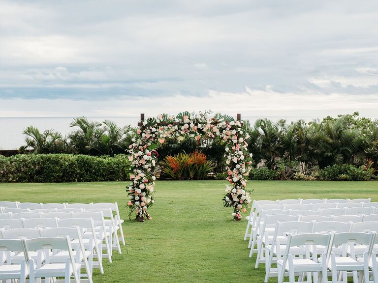 beautiful destination wedding in kauai hawaii overlooking poipu beach at sunset