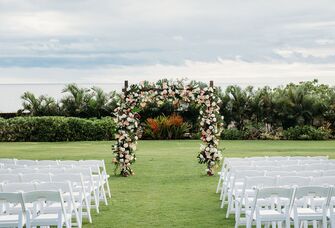 beautiful destination wedding in kauai hawaii overlooking poipu beach at sunset