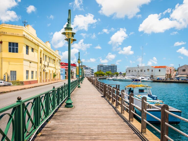 View of a wooden promenade in the colorful city of Bridgetown. 