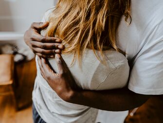 Two people hugging