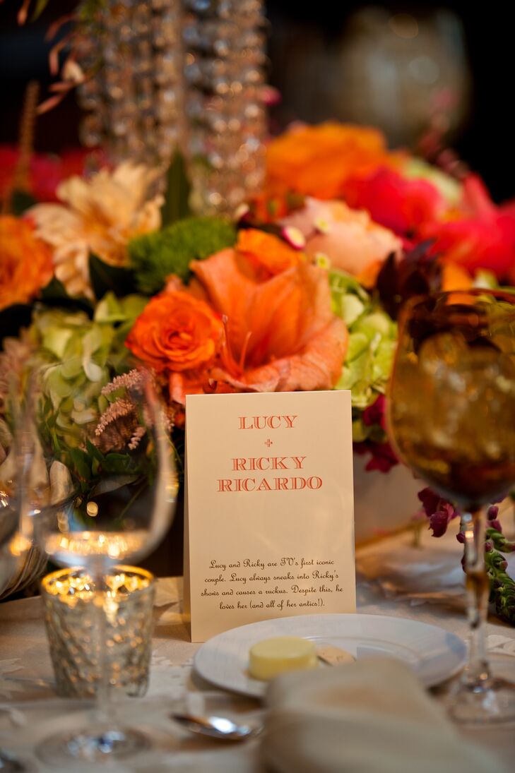 The “table numbers,” made by Magnificent Milestones, were named after famous couples, including Marie and Pierre Curie, Jim and Pam from "The Office," Guinevere and Lancelot and Lucy and Ricky Ricardo. Each card was tented on the corresponding table with a description of the couple.