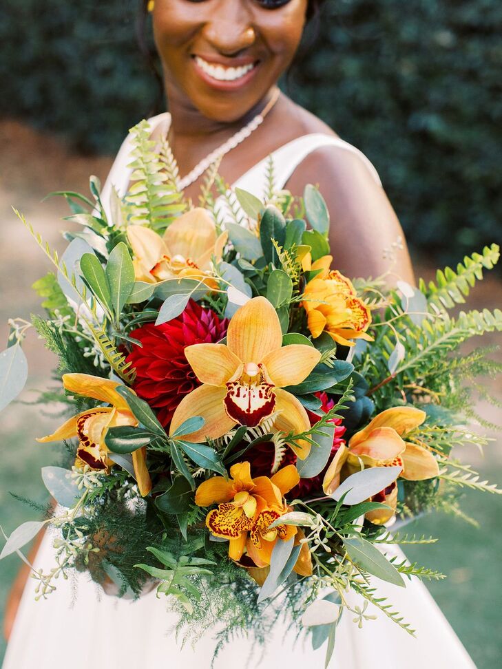 Orange Orchid Bouquet at Ballantyne Country Club Wedding in Charlotte, North Carolina