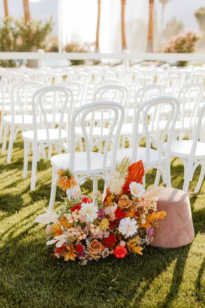 Bright, Bold Flower Arrangement on Lawn Outdoor Ceremony With Retro Vibe