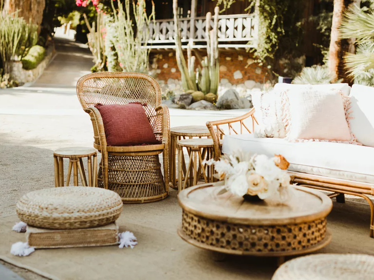 A cozy selection of wicker outdoor furniture in autumnal colors.