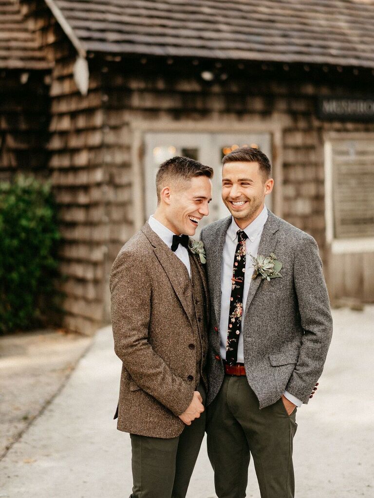 Grooms wearing boho mismatched textured suit jackets