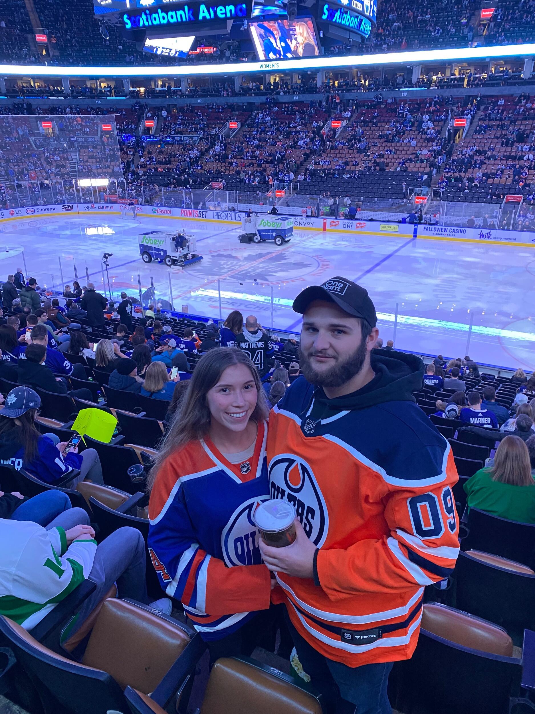 We went to our first Oilers game together. Fun fact: Ethan actually got Brooke into watching sports!
