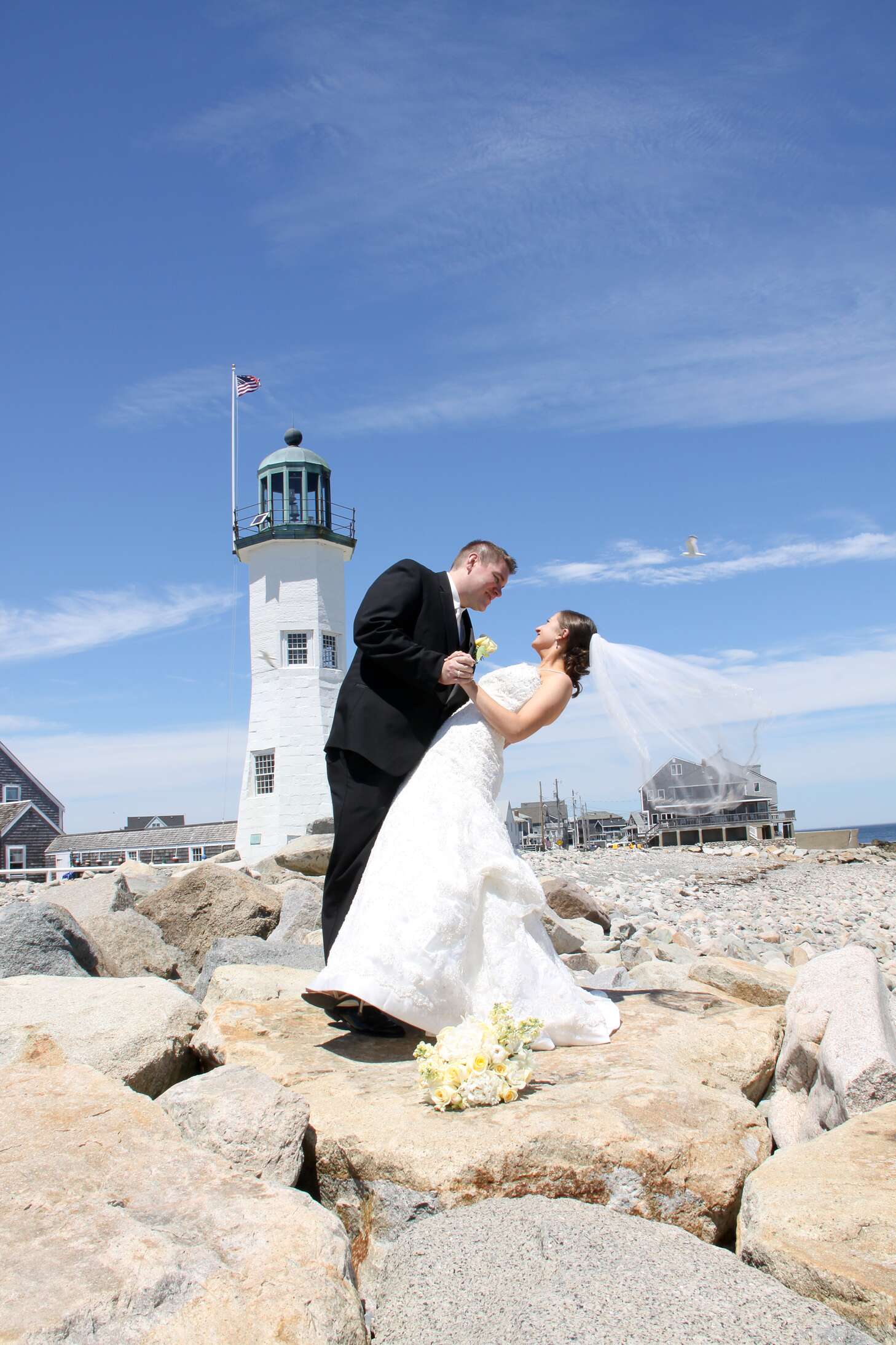 Bride and Groom with Lighthouse in Scituate, Massachusetts