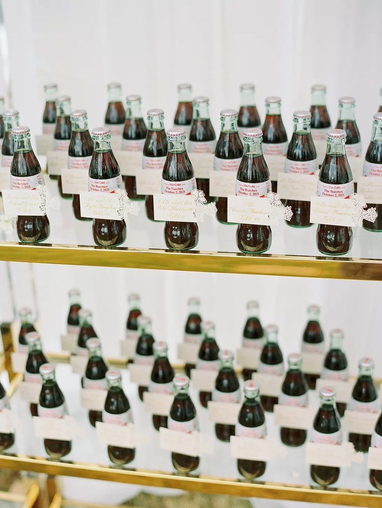 Delightful miniature coke bottle wedding favors.