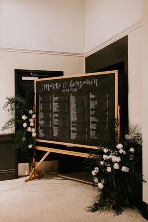 Black-and-White Chalkboard Seating Chart with Flower Arrangements