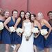 For her bridesmaids, Suzie picked the navy color but allowed them to each pick their own dress style. "I wanted them to feel confident and beautiful in what they wore standing next to me!" says Suzie.