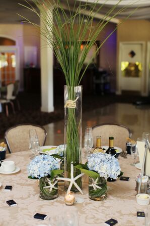 Whimsical Starfish Accented Centerpieces With Greenery