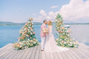 Couple Sharing Kiss on Waterfront at Ekies All Senses Resort in Greece