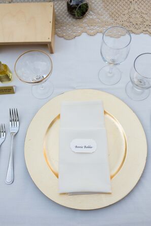 Gold Plates With White Linens