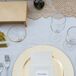 Gold Plates With White Linens