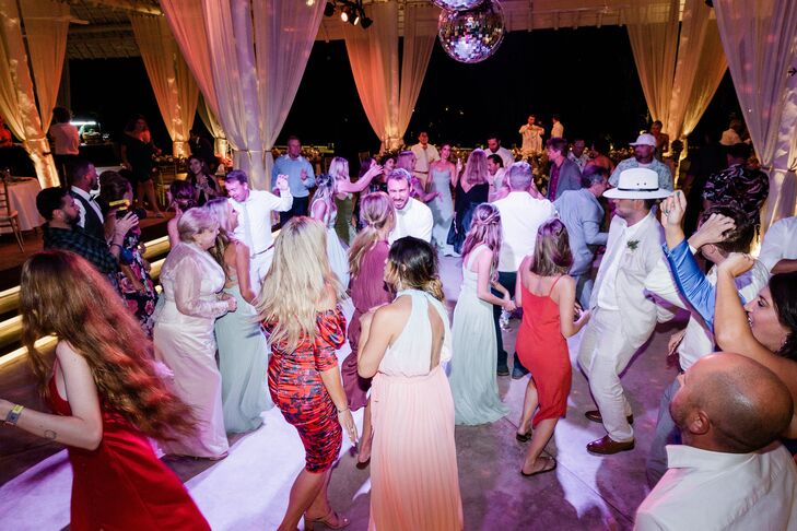 Wedding Guests Dancing Under Disco Ball at Reception