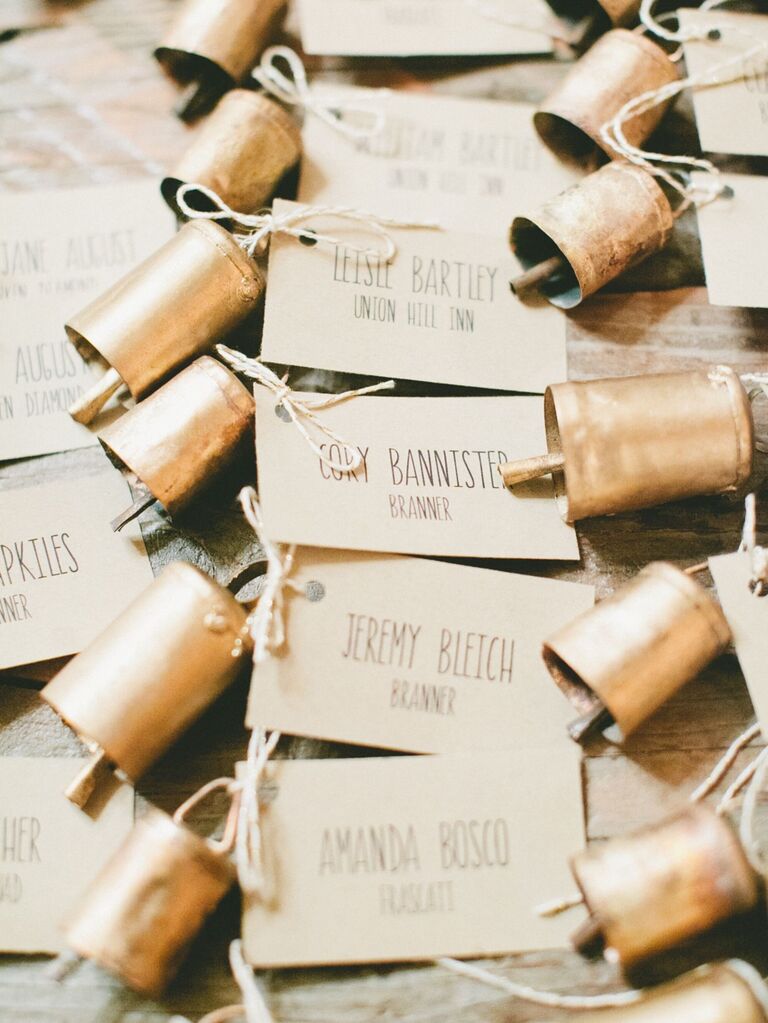 Rustic cow bell escort cards. 