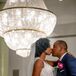 Newlywed Couple Portrait with Ballroom Chandelier