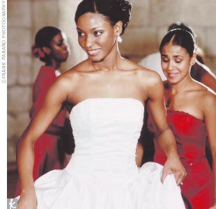 Straps (added after purchase) were detailed with glass beads and seed pearls, and tucked into the gown after the ceremony.
