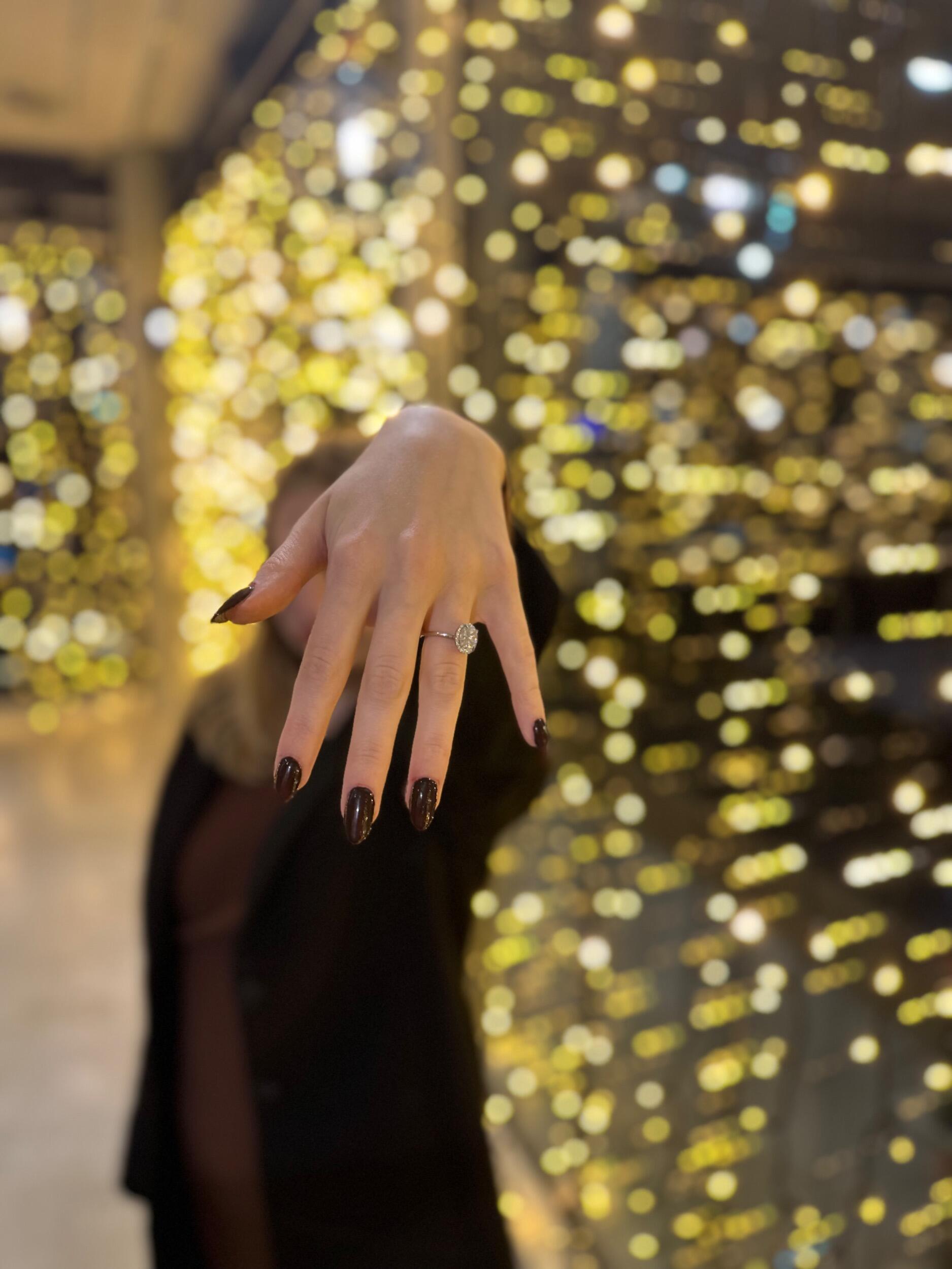On Christmas morning, Melina flew into Amsterdam to meet Lucas. That evening on the roof of the A'DAM tower, he ignored Melina's delirious jet lag and proposed!
