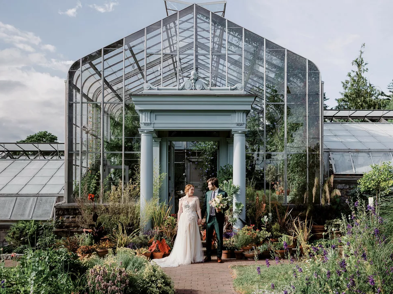A garden glasshouse wedding reception at Wave Hill in Bronx, New York