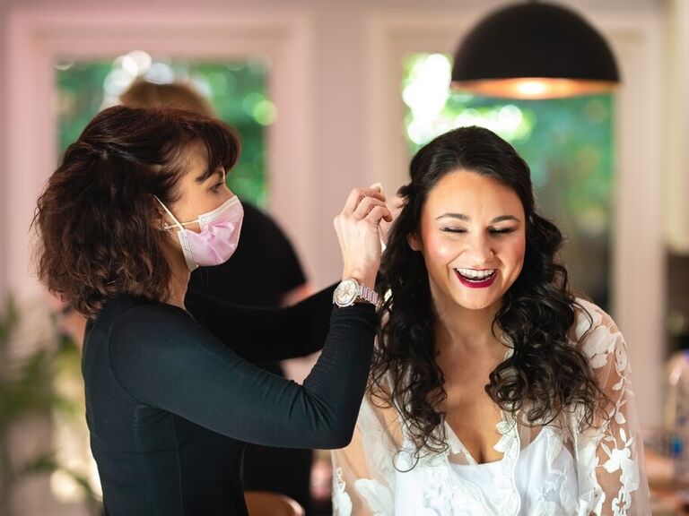 Bride gets her hair and makeup done by HT Salon. 