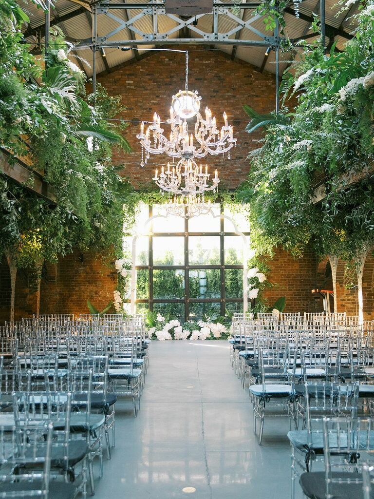 Loft venue with acrylic chairs and acrylic chandeliers