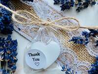 Small, affordable heart-shaped soap wedding favor in clear wrap with Thank You sticker