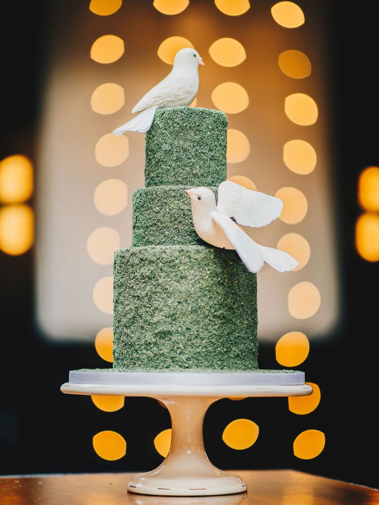 Green three-tier bridal shower cake with dove decorations