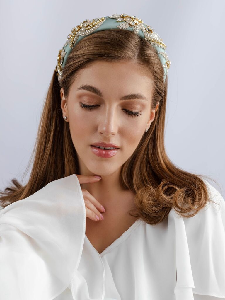 Blue bedazzled bridal headband by Elena Honch. 