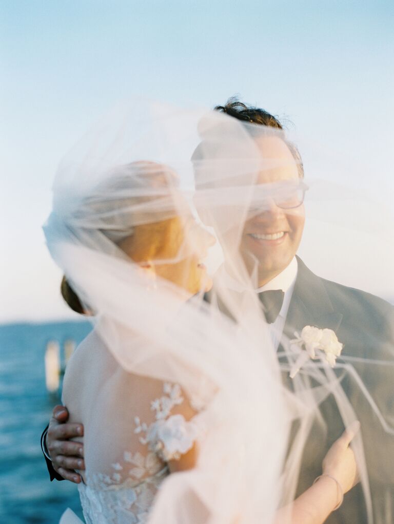Couple hugging in the wind