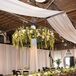 Floral Table Runners and Greenery-Draped Chandelier