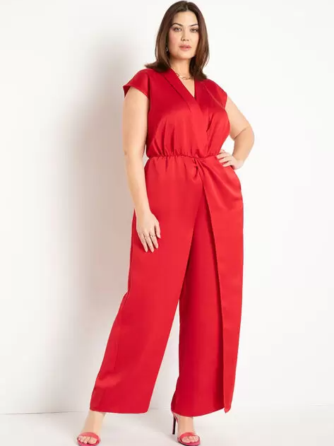 Model wearing red jumpsuit with short sleeves and side seam pockets