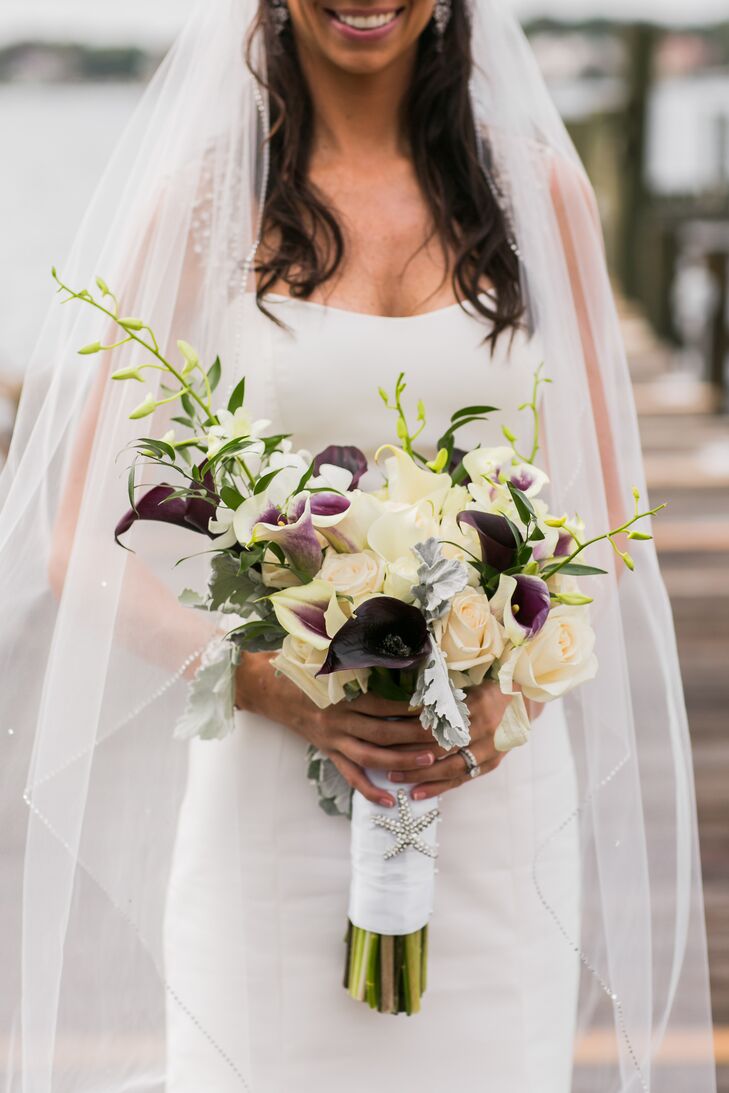 Caitlin carried a modern bouquet of white and purple calla lilies accented with dusty miller.