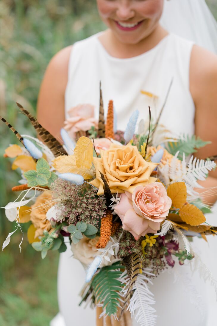 Bouquet With Yellow Roses, Dried Leaves and Pheasant Feathers