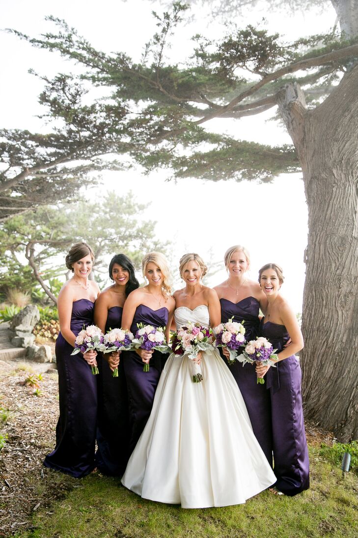 Kim's five bridesmaids wore dark purple formal-length gowns with matching bouquets of dahlias.