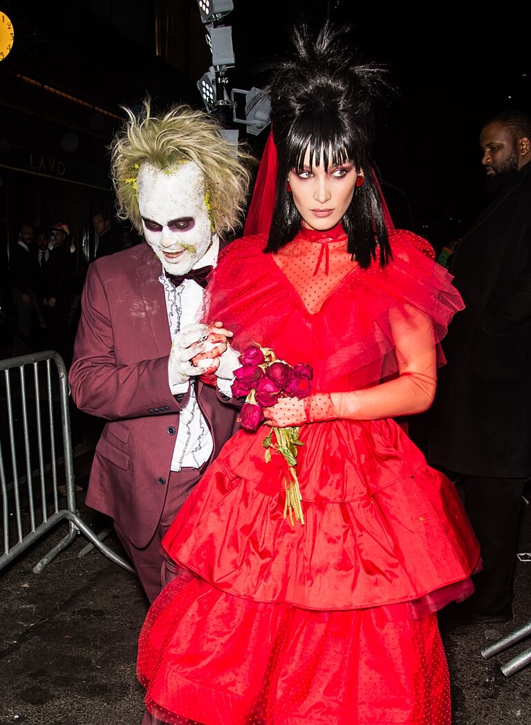 Bella Hadid and The Weeknd as Beetlejuice and Lydia Deetz