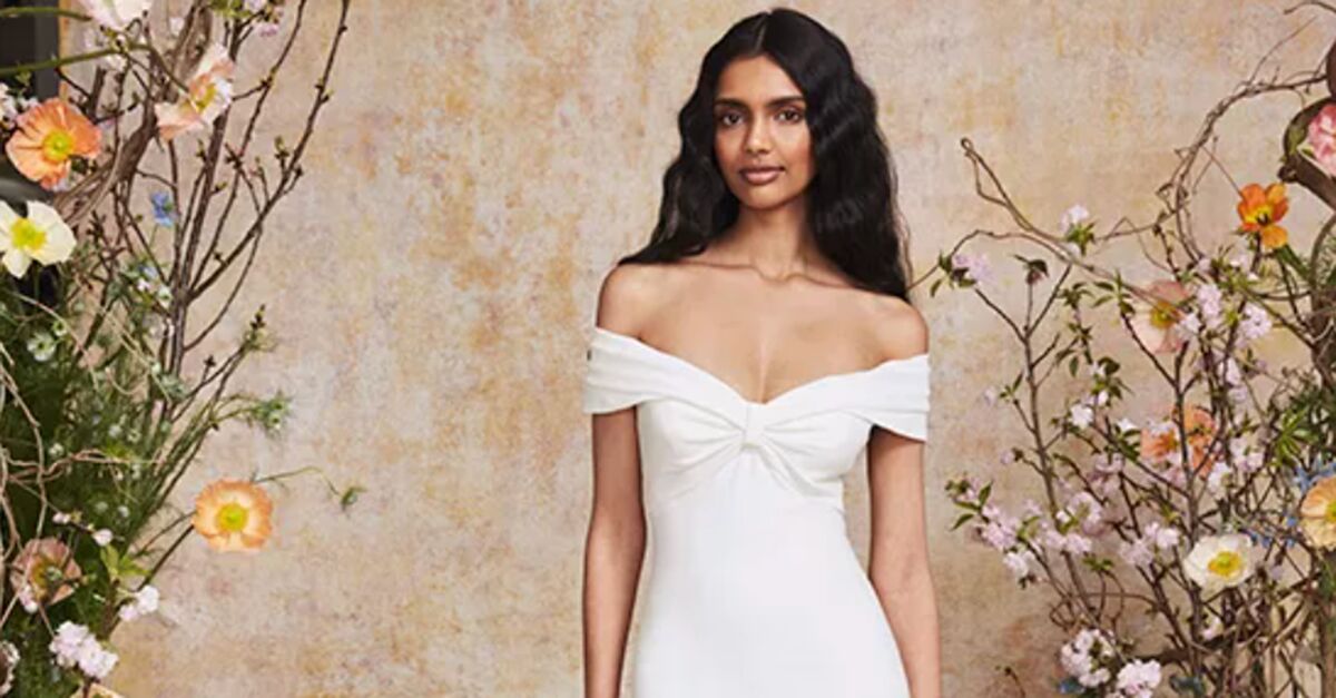 A Chic And Billowy White Dress That Hides Everything